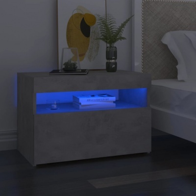 Mesa de cabeceira cinzenta com luz azul LED e decoração junto à cama