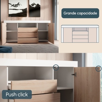 Móvel com gavetas e portas abertas em madeira clara num ambiente com parede de madeira e pinturas pretas e brancas.