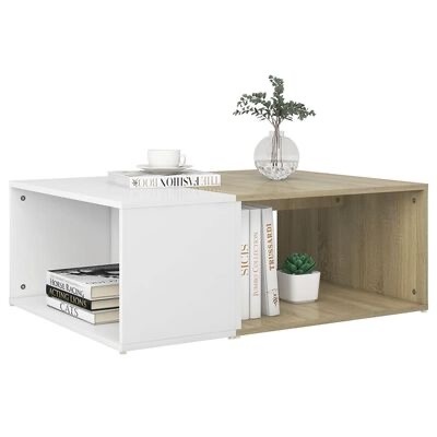 Mesa de centro com cubos branco e madeira, livros e plantas decorativas.