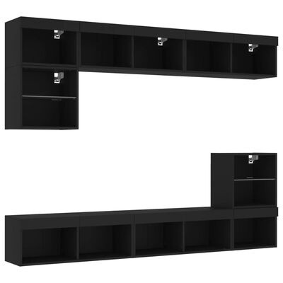 Móvel modular de televisão preto com compartimentos abertos e cabides metálicos