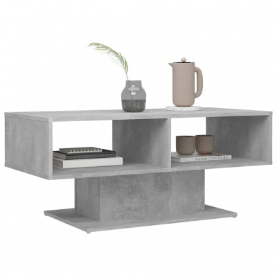 mesa de centro cinza com decoração em fundo branco