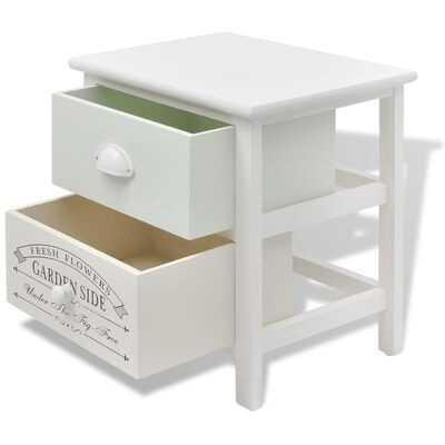 Mesa de cabeceira branca com duas gavetas abertas, uma verde claro e outra creme com texto