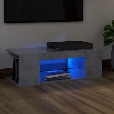 Mesa de centro cinzenta com iluminação azul e livros