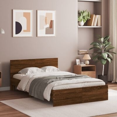 Quarto moderno com cama de madeira castanha, mesa de cabeceira, estante com livros e plantas e quadros abstratos na parede rosa