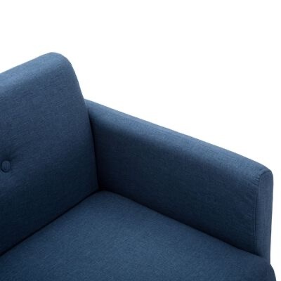 Canto de sofá azul escuro com botão no encosto