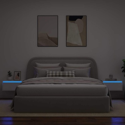 Quarto moderno com cama estofada cinzenta e mesas de cabeceira com iluminação azul