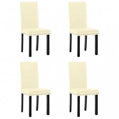 Quatro cadeiras bege com pernas pretas e rebites metálicos