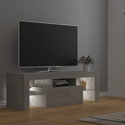 Móvel TV cinzento estilo moderno com planta e chão madeira clara