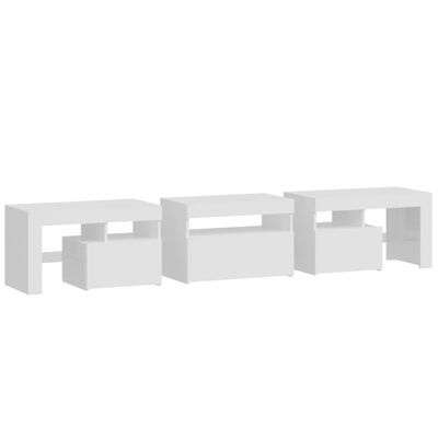 Três mesas brancas modernas com compartimentos abertos e fechados