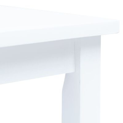 Canto de mesa branca com textura lisa e estrutura em madeira.