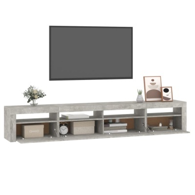 Móvel de TV cinza cimento com decoração minimalista e três compartimentos