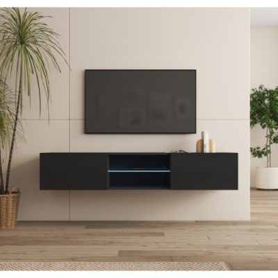 Móvel de TV preto suspenso com televisão montada na parede e plantas decorativas.