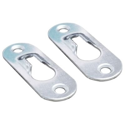 Duas placas metálicas prateadas com orifícios circulares e cortes em forma de gota