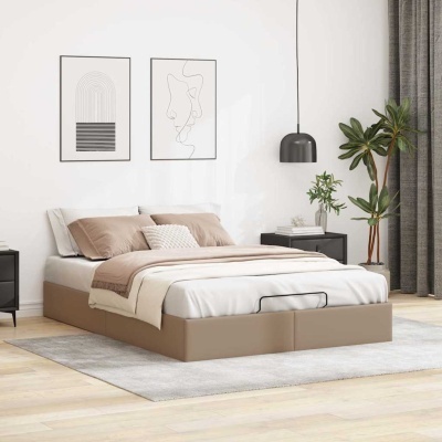 Cama bege com roupa de cama branca e bege num quarto com mobília preta, plantas, quadros de linhas e cortinas cinza.