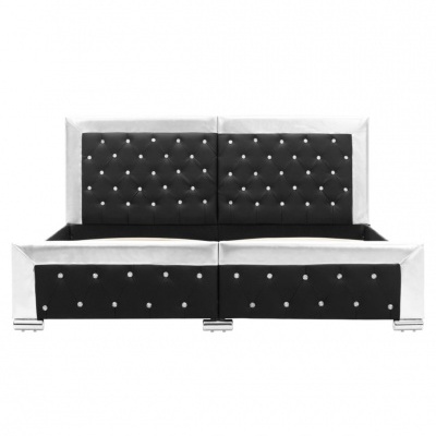 Cama estofada preta e branca com botões prateados
