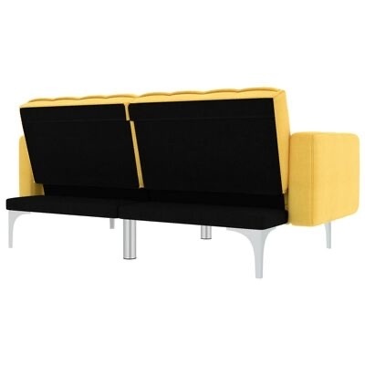 Sofá amarelo com almofadas pretas e estrutura metálica prateada visto por trás