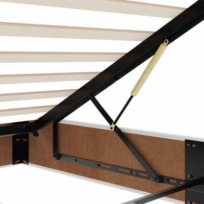 Estrutura interna de cama em metal preto, ripas de madeira clara e mola amarela