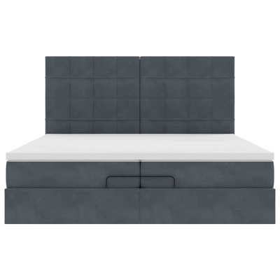 Cama estofada cinzenta com cabeceira acolchoada e colchão branco