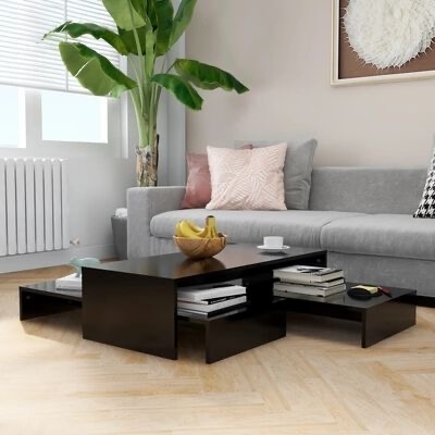 Mesa de centro modular preta em sala com sofá cinzento e planta verde