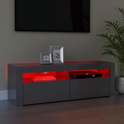 Móvel televisão cinza escuro com luz vermelha, molduras, livro e leitor DVD numa sala moderna