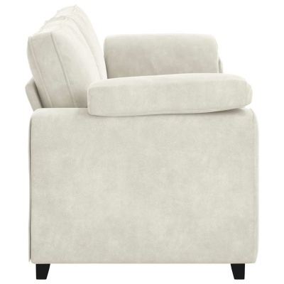 Sofá bege de tecido visto de perfil