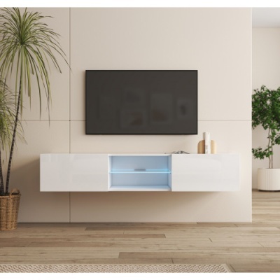 Móvel suspenso branco com TV preta montada na parede e plantas ao lado