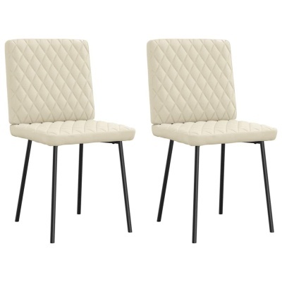 Duas cadeiras bege com pernas pretas e padrão acolchoado em losangos
