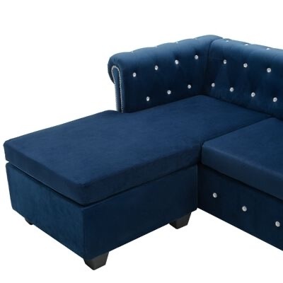 Sofá em forma de L azul escuro com chaise longue e botões decorativos