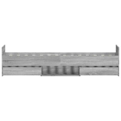 Cama individual em madeira clara com gavetões inferiores