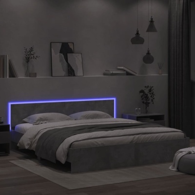 Quarto com cama estofada cinzenta iluminada com LED azul