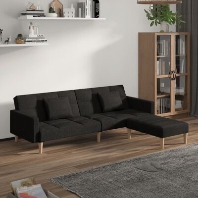 Sofá chaise longue preto numa sala com móveis de madeira e decor minimalista