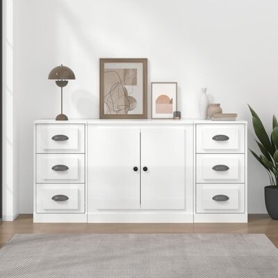 Aparador branco com gavetas e decoração minimalista numa sala moderna