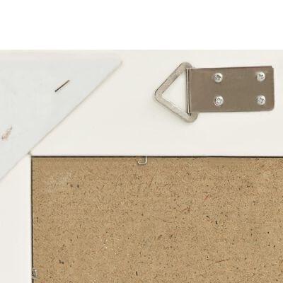 Parte traseira de moldura branca com suporte metálico triangular e cartão castanho