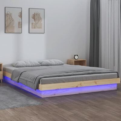 Cama de madeira flutuante com luzes LED azuis e roupa de cama cinzenta num quarto moderno.