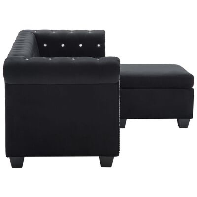 Sofá preto com botões brilhantes e assento estofado de vista lateral