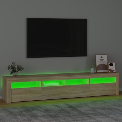 Móvel de televisão de madeira clara com luzes LED verdes e televisão preta na parede cinza