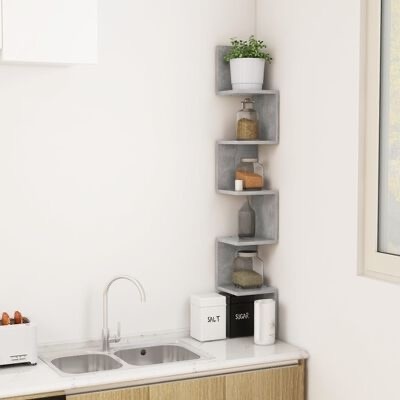 Estante cinza de cimento aparente com itens decorativos e recipientes de cozinha junto a pia dupla