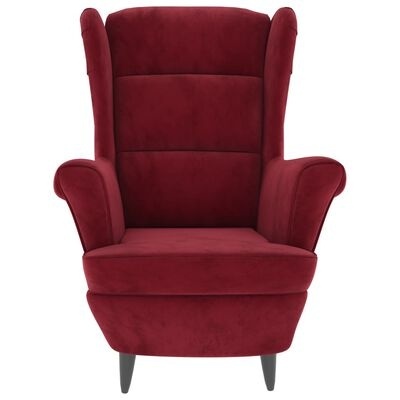 Poltrona de veludo vermelho com pernas pretas