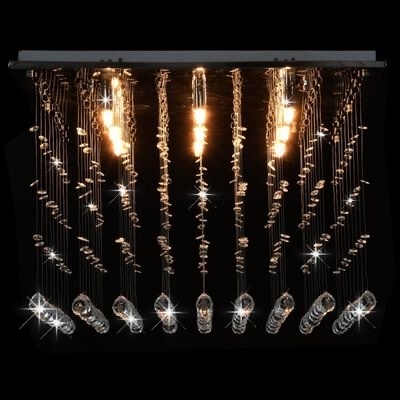 Lustre moderno com cristais transparentes e luz quente suspenso