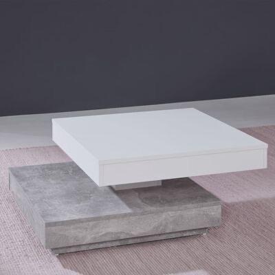 Mesa de centro quadrada moderna com base cinzenta imitando pedra e tampo branco, sobre tapete rosa, parede cinza