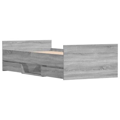 Cama de madeira cinza claro com cabeceira e laterais