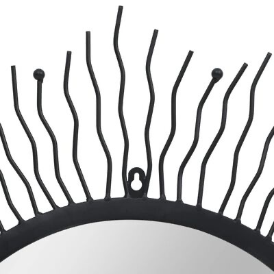 Espelho redondo com estrutura metálica preta em forma de raios de sol