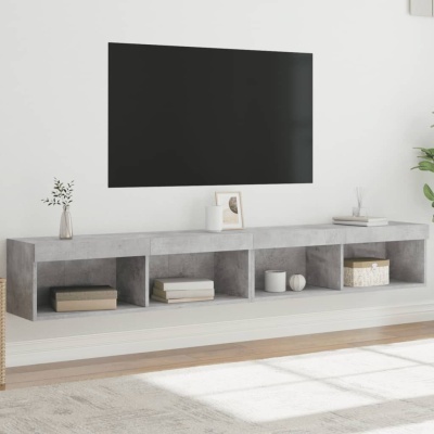 Móvel de TV suspenso em betão cinza com objetos decorativos