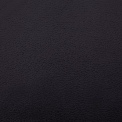 Textura de pele sintética preta com padrão natural.