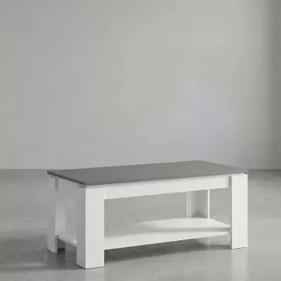 Mesa de centro com tampo cinzento e estrutura branca num ambiente minimalista