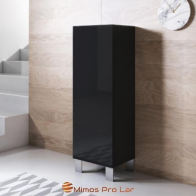 Armário alto preto com pés metálicos em ambiente interior moderno