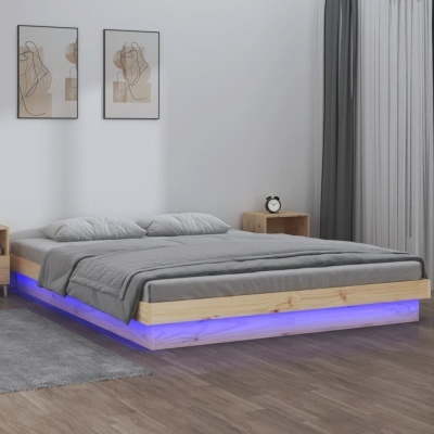 Cama de casal flutuante com iluminação azul e decoração minimalista