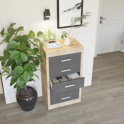 Móvel de madeira claro com gavetas cinzentas e decoração com plantas e objetos