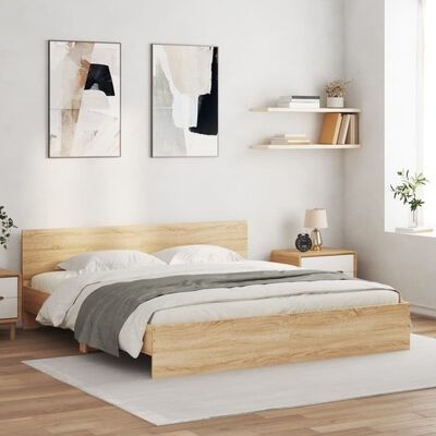 Quarto com cama de casal em madeira clara e decoração minimalista.