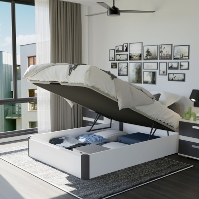 Cama branca com colchão levantado mostrando arrumação interior, decoração moderna em ambiente claro